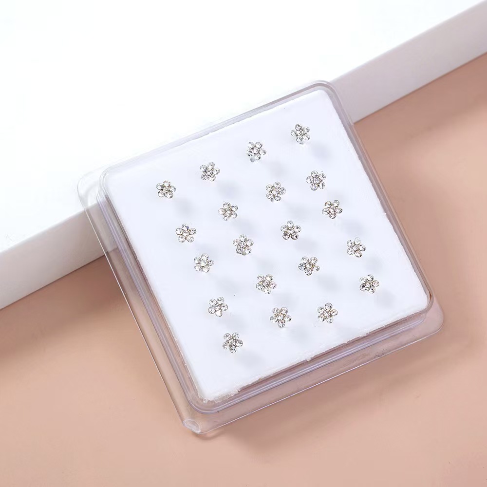 Body Jewelry Display Case - 20 ชิ้น/กล่อง Body เครื่องประดับเจาะจมูกแหวนจมูกเข็มเงินสําหรับผู้หญิงคริสตัลดอกไม้จมูกเครื่องประดับขายส่ง
